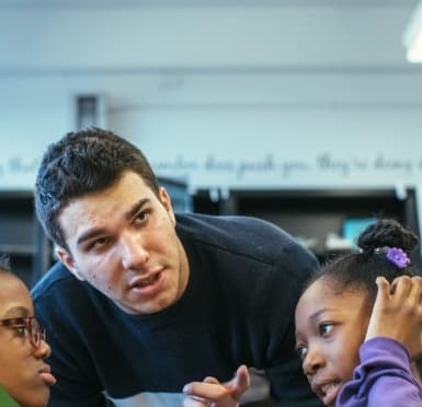 Josh working with students